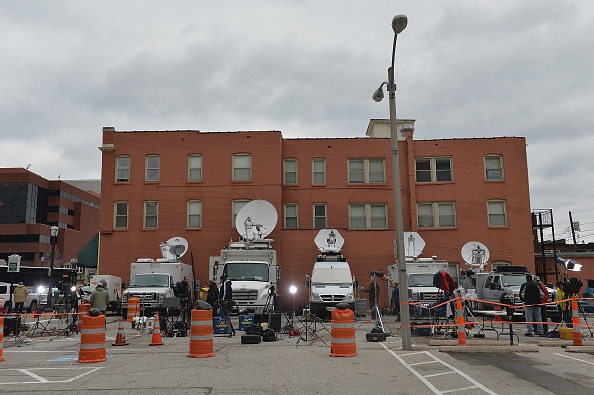 Media satellite trucks convene outside the Buzz Westfall Justice Center in Clayton, Missouri, on November 24, 2014. (Michael B. Thomas/AFP/Getty Images)