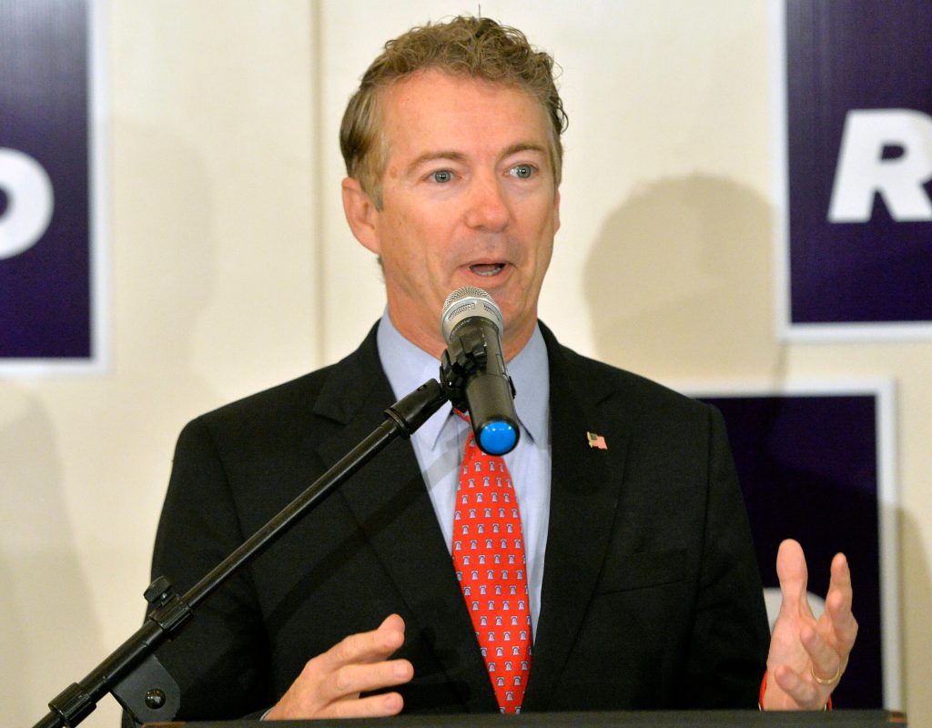 Paul raps liberals who mock prayer, push gun control