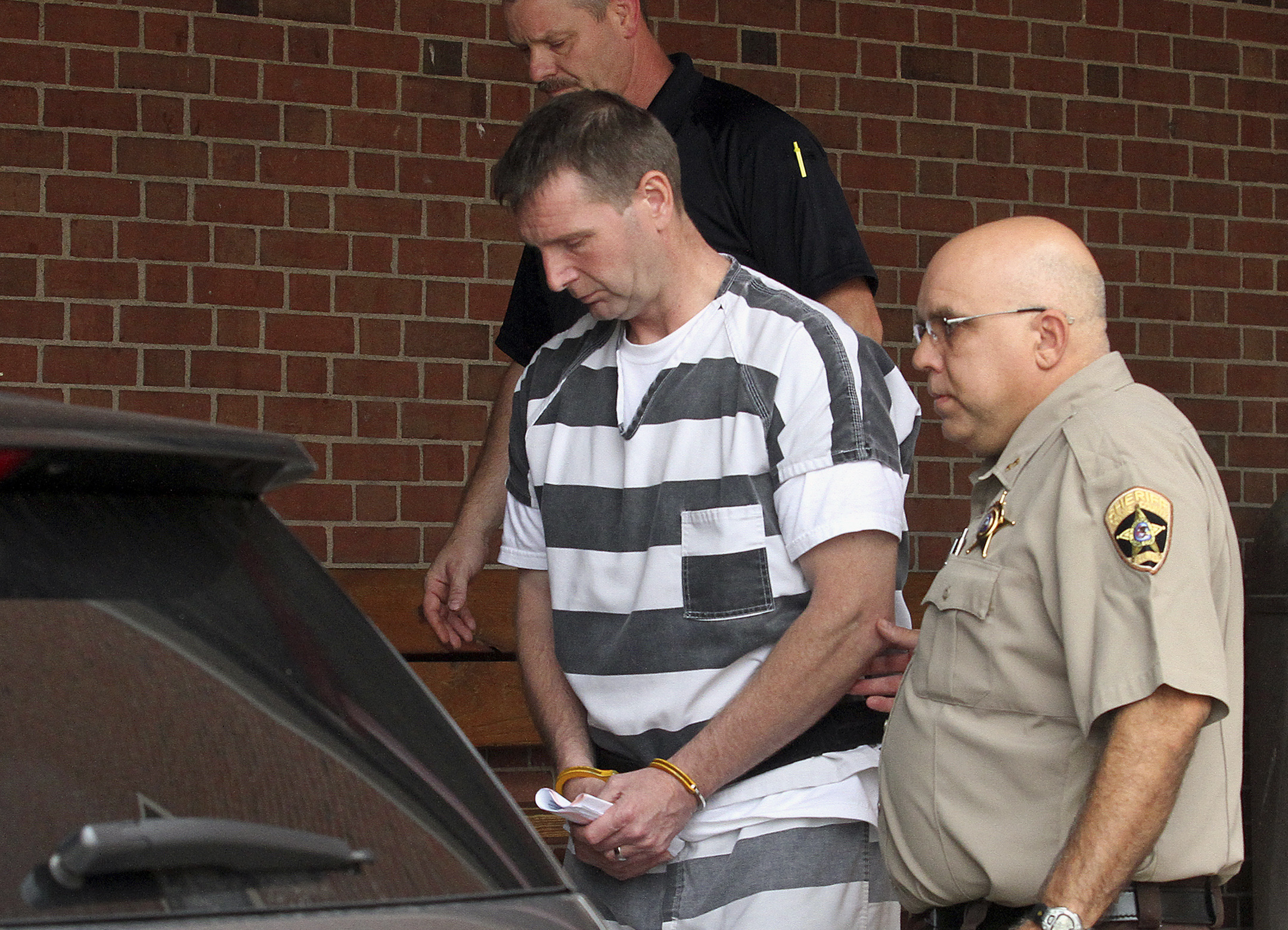 Former Adams County prosecutor charged with murder
