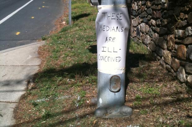 Montgomery County traffic islands blow tires, draw protests