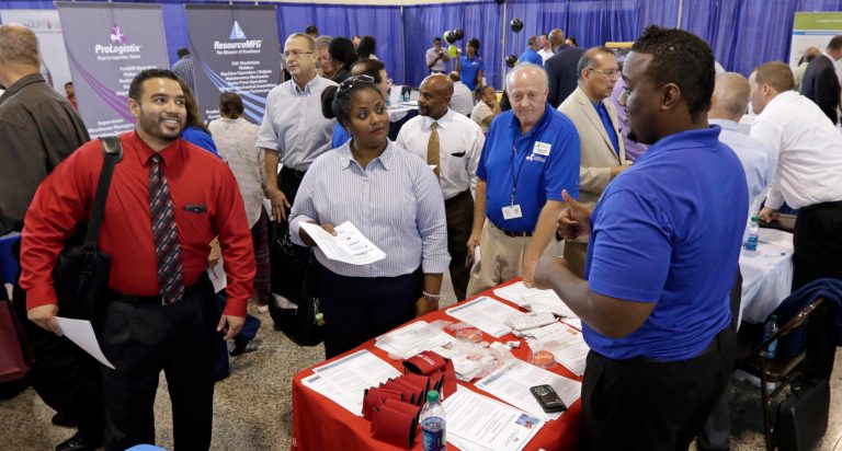 Job seekers check out the opportunities at a Hiring Fair For Veterans in Fort Lauderdale, Fla. (AP/Alan Diaz)