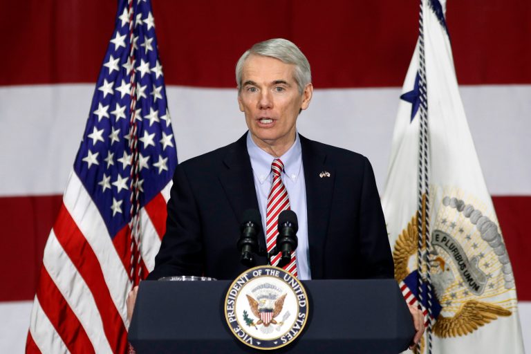 FILE - Int his April 1, 2017, file photo, Sen. Rob Portman, R-Ohio, speaks before Vice President Mike Pence in Reynoldsburg, Ohio. Republicans from energy-producing states are under pressure as the Senate considers whether to overturn an Obama-era regulation that would restrict harmful methane emissions escaping from oil and gas wells on public land. Portman said May 8, he will support the repeal effort after weeks of public silence, saying he got assurances from Interior Secretary Ryan Zinke that he will take steps to reduce methane waste. (AP Photo/John Minchillo, File)