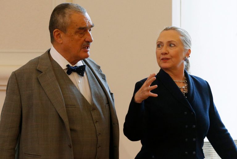   Czech Republic's Foreign Minister Karel Schwarzenberg, left, and US Secretary of State Hillary Rodham Clinton, right, arrive for their press conference in Prague, Czech Republic, Monday, Dec. 3, 2012. Secretary of State Clinton is lobbying the Czech Republic authorities to approve an American contract bid for an expansion of a nuclear power plant. (AP Photo/Petr David Josek)  
