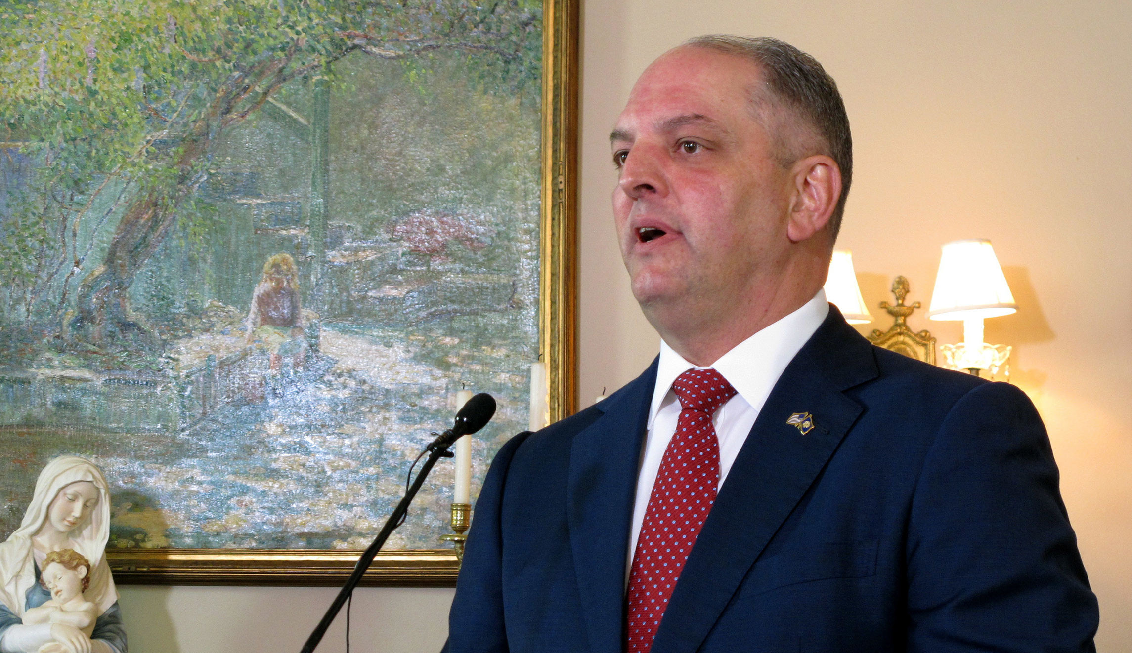 Louisiana’s John Bel Edwards wants Trump tax cuts to benefit power customers