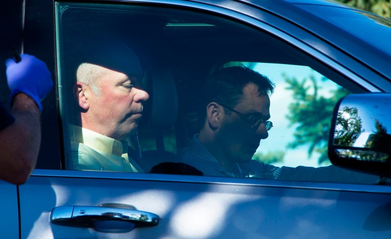 Republican candidate for Montana's only U.S. House seat, Greg Gianforte, sits in a vehicle near a Discovery Drive building Wednesday in Bozeman, Mont. (Freddy Monares/Bozeman Daily Chronicle via AP)