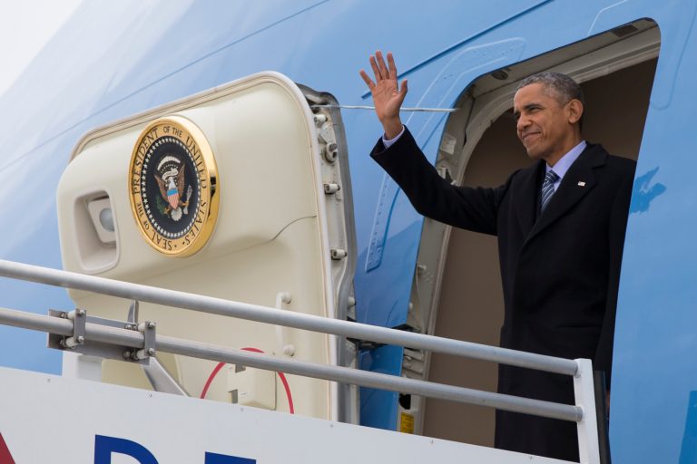 President Barack Obama waves as he arrives on Air Force One at Indianapolis International Airport in Indianapolis, Friday, Feb. 6, 2015. (AP Photo/Evan Vucci)