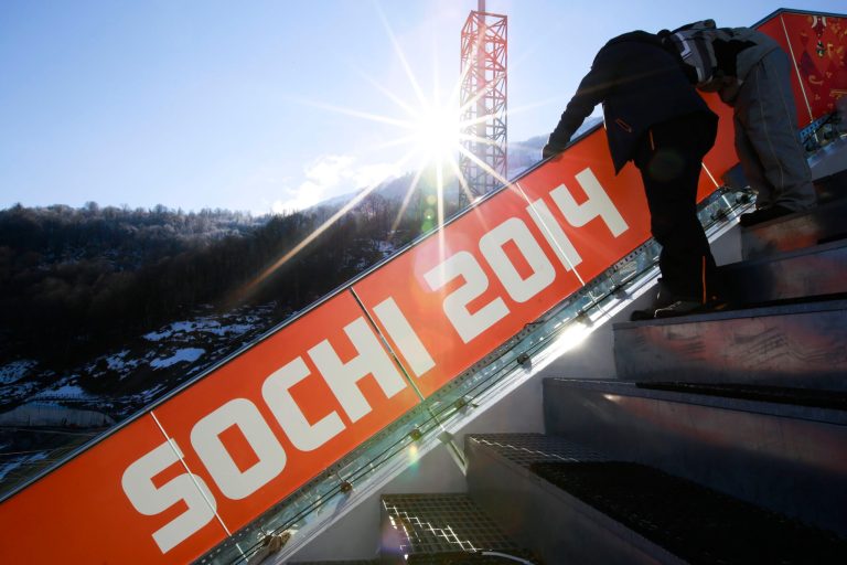 The sun rises at the RusSki Gorki Jumping Center of the Sochi 2014 Winter Olympics, Saturday, Feb. 1, 2014, in Krasnaya Polyana, Russia, where the snow and sliding sports venues for the 2014 Winter Olympics are located. (AP Photo/Gero Breloer)