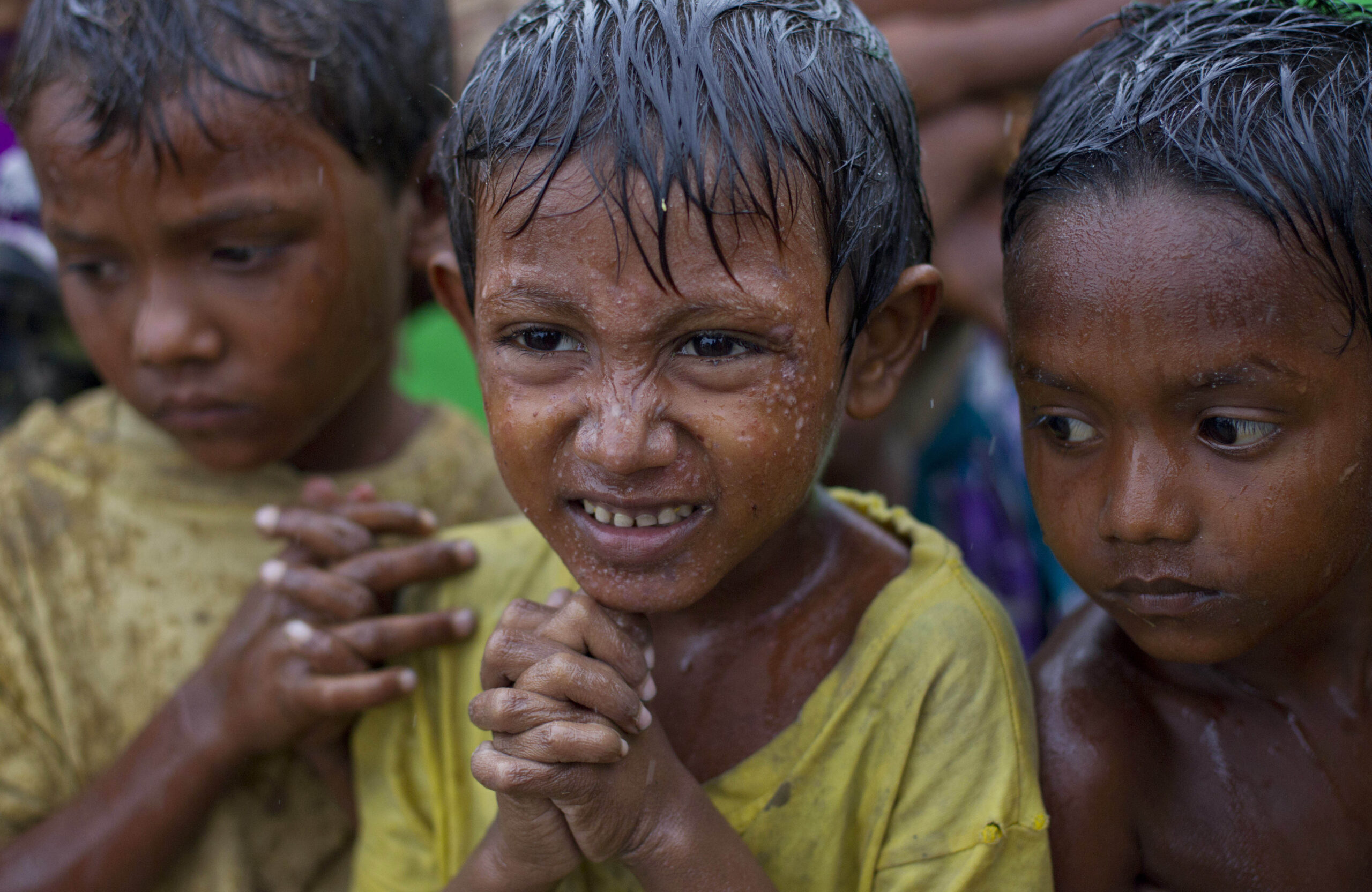 Boats carrying fleeing Rohingya Muslims capsize