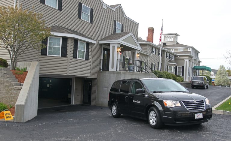 CORRECTS LOCATION TO NORTH ATTLEBOROUGH INSTEAD OF ATTLEBORO - A vehicle believed to be carrying the body of Boston Marathon bombing suspect Tamerlan Tsarnaev backs into an underground garage at the Dyer-Lake Funeral Home, Thursday, May 2, 2013, in North Attleborough, Mass. The body of Tsarnaev, who was the subject of a massive manhunt and died after a gunbattle with police, was claimed on Thursday. (AP Photo/Stew Milne)
