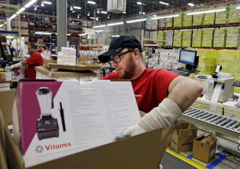 In this April 15, 2014 photo, Charles Rajecky packs a completed blender for warehousing at the Vitamix manufacturing facility in Strongsville, Ohio. The Commerce Department releases durable goods for March on Thursday, April 24, 2014. (AP Photo/Mark Duncan)