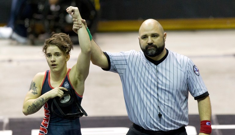 Mack Beggs of Euless Trinity, a transgender senior, defeated Chelsea Sanchez of Morton Ranch to defend his Class 6A girls 110-pound title during the UIL State Wrestling Championships at the Berry Center on Saturday in Cypress, Texas. Beggs, who was born female, was not allowed to enter the boys' tournament because the rules for Texas public high schools require athletes to compete under the gender on their birth certificate. So, for the last two years, Beggs' very role in the tournaments has stirred debate about what transgender students are allowed to do in sport. (Jason Fochtman /Houston Chronicle via AP)