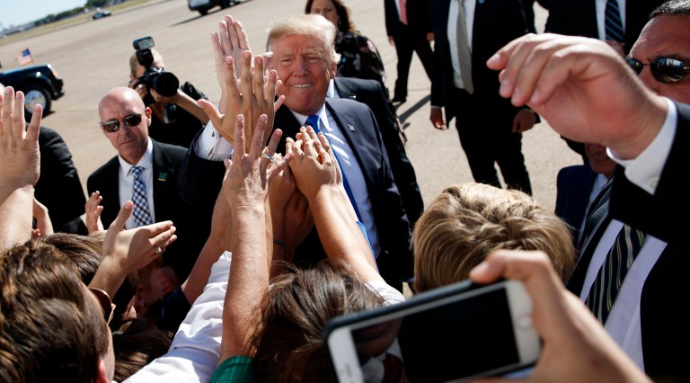 An 80-year-old Florida man named Donald changed his middle name to Trump to show his admiration for President Trump. (AP Photo/Evan Vucci)