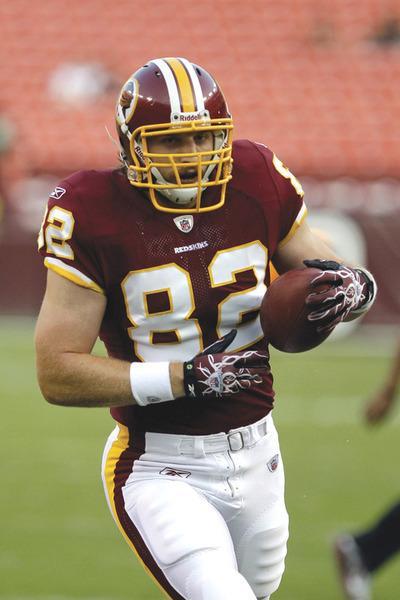 Rob Carr/Getty Images
Logan Paulsen, now the Redskins'No. 2 tight end, caught two passes for 48 yards against the Panthers on Sunday.