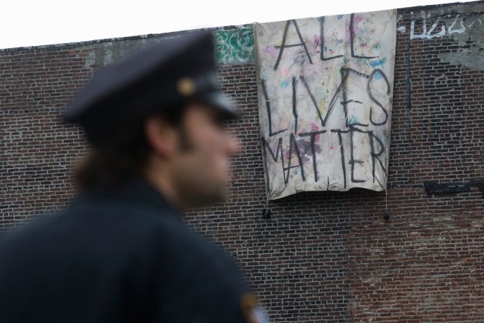 The NAACP is calling for new gun-control measures following the shooting of two New York police officers over the weekend. (AP Photo)