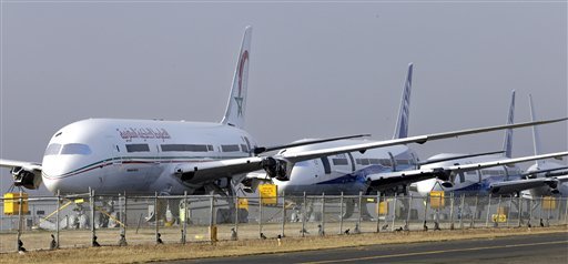 FILE - In this Jan. 17, 2013 file photo, a line of 787 jets are parked at Paine Field in Everett, Wash.  After two separate and serious battery problems aboard Boeing 787s, it wasn't U.S. authorities who acted first to ground the plane. It was Japanese airlines. The unfolding saga of Boeing's highest-profile plane has raised new questions about federal oversight of aircraft makers and airlines.  (AP Photo/Elaine Thompson, file)