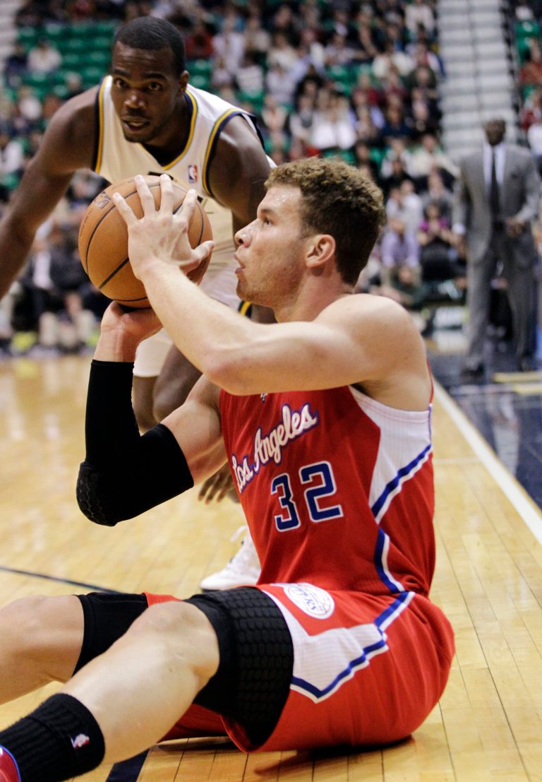   Los Angeles Clippers power forward Blake Griffin (32) shoots from the floor as Utah Jazz power forward Paul Millsap rushes to him in the first quarter of an NBA basketball game, Monday, Dec. 3, 2012, in Salt Lake City. (AP Photo/Rick Bowmer)  