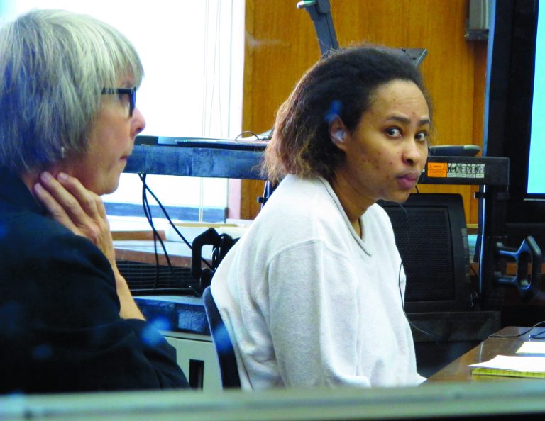 Annette Morales-Rodriguez, right, appears at her Milwaukee trial on Tuesday, Sept. 18, 2012, to face charges that she killed a pregnant woman and tried to steal her full-term fetus. Her defense attorney, Debra Patterson, left, told jurors the homicides weren't intentional, and that her client never meant for the mother or baby to die.(AP Photo/Dinesh Ramde)