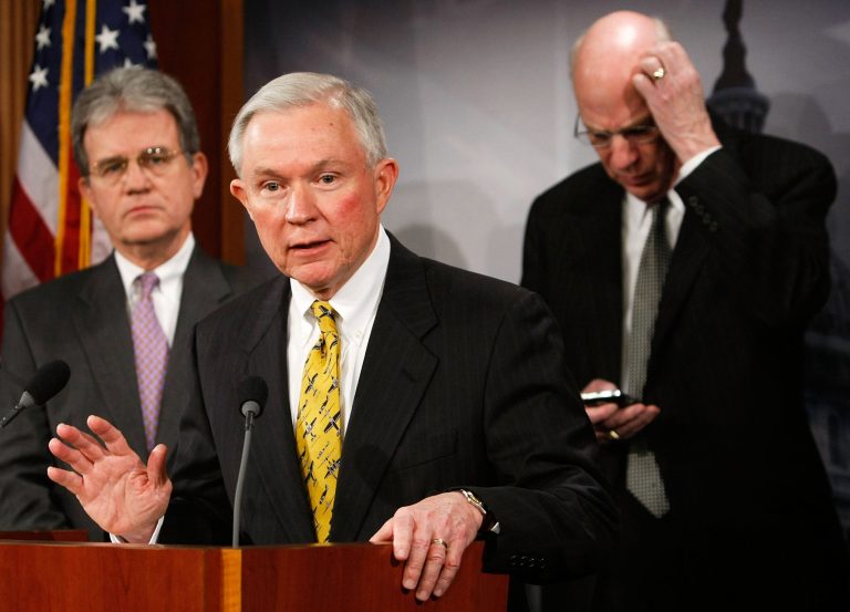 WASHINGTON - JANUARY 29:  U.S. Sen. Jeff Sessions (R-AL) (C) speaks as Sen. Robert Bennett (R-UT) (R), and Sen. Tom Coburn (R-OK) (L) listen during a news conference on the economic stimulus package on Capitol Hill January 29, 2009 in Washington, DC. Senate Republicans held a news conference to voice their opposition to the package.  (Photo by Alex Wong/Getty Images)