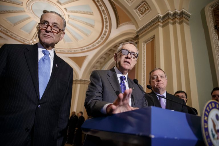 From left, Democratic leaders Sen. Chuck Schumer, D-N.Y., Senate Minority Leader Harry Reid, D-Nev., and Senate Minority Whip Dick Durbin, D-Ill., at the Capitol in Washington, Tuesday, March 3, 2015. (AP Photo/J. Scott Applewhite)