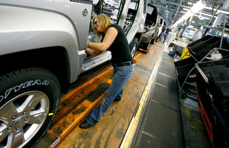 FILE - In this Nov. 16, 2011 file photo, Pam Bialecki works on a 2012 Jeep Wrangler at the Chrysler Toledo Assembly complex, in Toledo, Ohio. Ohio Gov. John Kasich and Toledo's mayor spoke with Chrysler CEO Sergio Marchionne on a conference call Sunday, Oct. 5, 2014, after he indicated it's possible that production of the next version of Jeep Wrangler could be moved from the Toledo facility. (AP Photo/Madalyn Ruggiero, File)