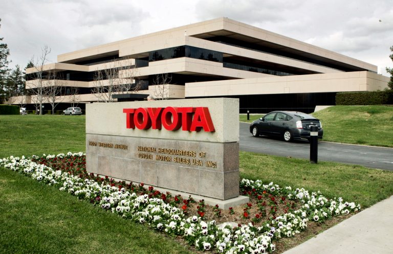 In this Jan. 23, 2008 file photo, a Prius enters Toyota North American headquarters in Torrance, Calif. (AP Photo/Reed Saxon, File)