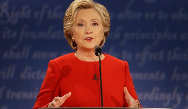 Clinton runs away from trade issue