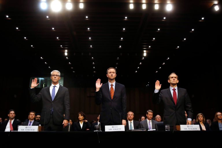 FILE - In this Wednesday, Nov. 1, 2017, file photo, from left, Facebook's General Counsel Colin Stretch, Twitter's Acting General Counsel Sean Edgett, and Google's Senior Vice President and General Counsel Kent Walker, are sworn in for a Senate Intelligence Committee hearing on Russian election activity and technology, on Capitol Hill in Washington. There were signs, some say telltale signs, of Russians using social media to meddle in the U.S. elections long before tech companies wised up to it. Could Facebook, Google and Twitter have caught the abuse earlier? (AP Photo/Jacquelyn Martin, File)
