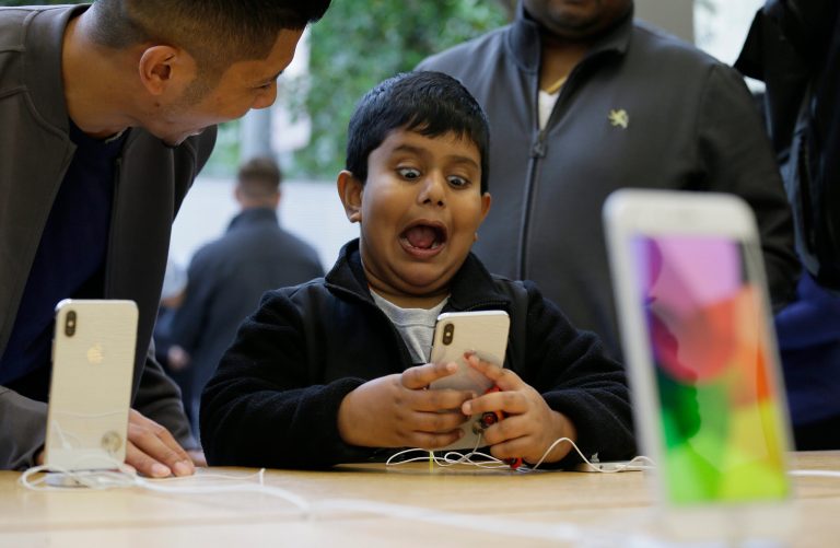 Teens' over-reliance on electronic devices for leisure can have devastating effects on their social and psychological health. (AP Photo/Eric Risberg)