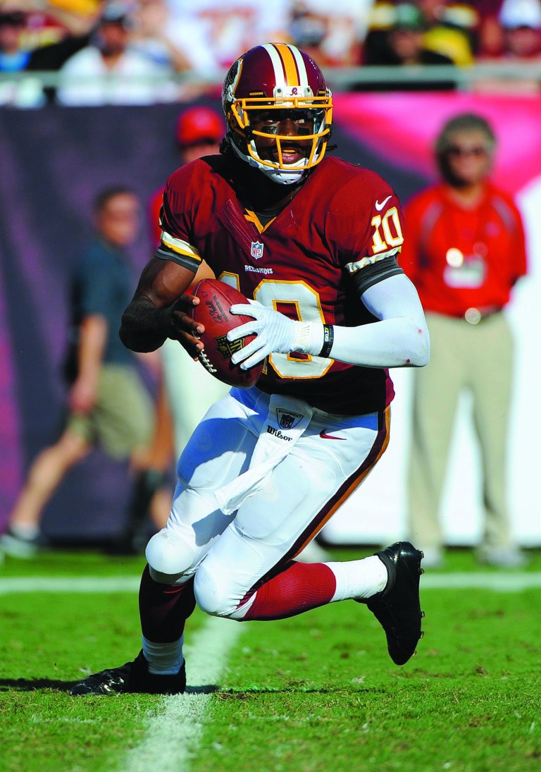 The Associated Press photos
On Sunday, the Washington Redskins will host the Atlanta Falcons at 1 p.m. and the Washington Nationals will play Game 1 of their NL Division Series at 3:07 p.m.