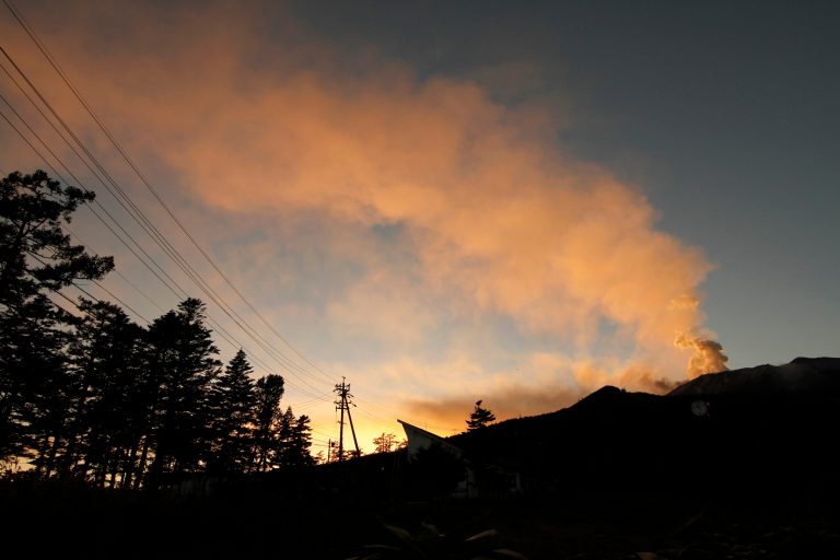 Smoke billows from Mount Ontake observed from Otaki Village, Nagano prefecture, central Japan, Sunday, Sept. 28, 2014. Rescue workers found 30 or more people unconscious and believed to be dead near the peak of the erupting volcano, local government and police said. Nagano prefecture posted on its website that about 30 people had heart and lung failure, the customary way for Japanese authorities to describe a body until police doctors can examine it. (AP Photo/Koji Ueda)