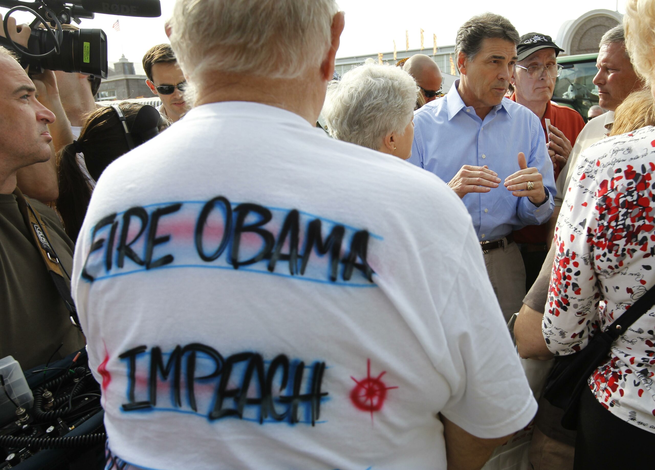 Team Obama deals the race card against Perry