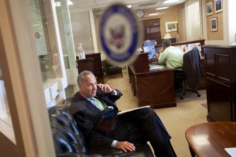 Sen. Charles Schumer, D-N.Y., make a cell phone call on Capitol Hill. Even though American intelligence agencies are aware of that situation, they haven't notified lawmakers. (AP Photo/Jacquelyn Martin)