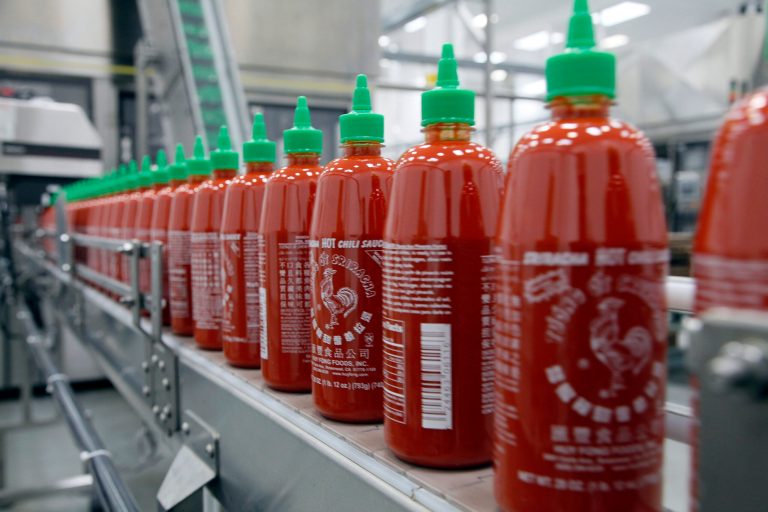 FILE - In the Tuesday, Oct. 29, 2013, file photo, Sriracha chili sauce is produced at the Huy Fong Foods factory in Irwindale, Calif. The Commerce Department reports on orders placed with U.S. factories in October, Thursday, Dec. 5, 2013. (AP Photo/Nick Ut, File)