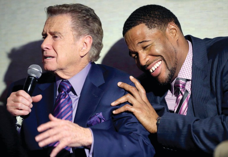 Seth Wenig/AP
Regis Philbin, left, will host a weekday sports talk show for the new Fox Sports 1, a 24-hour sports network that is scheduled to launch August 17.