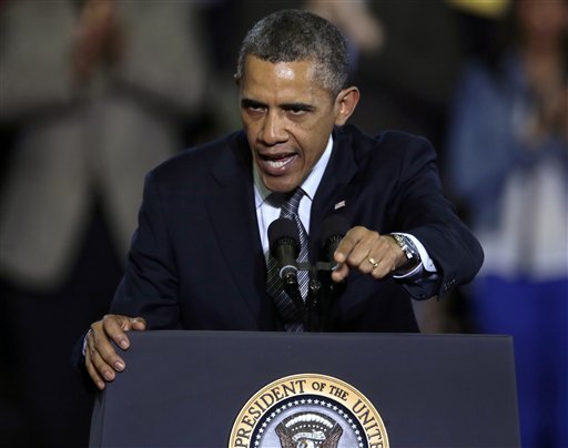 Fired up Obama demands assault weapons ban, 10-round magazine limit