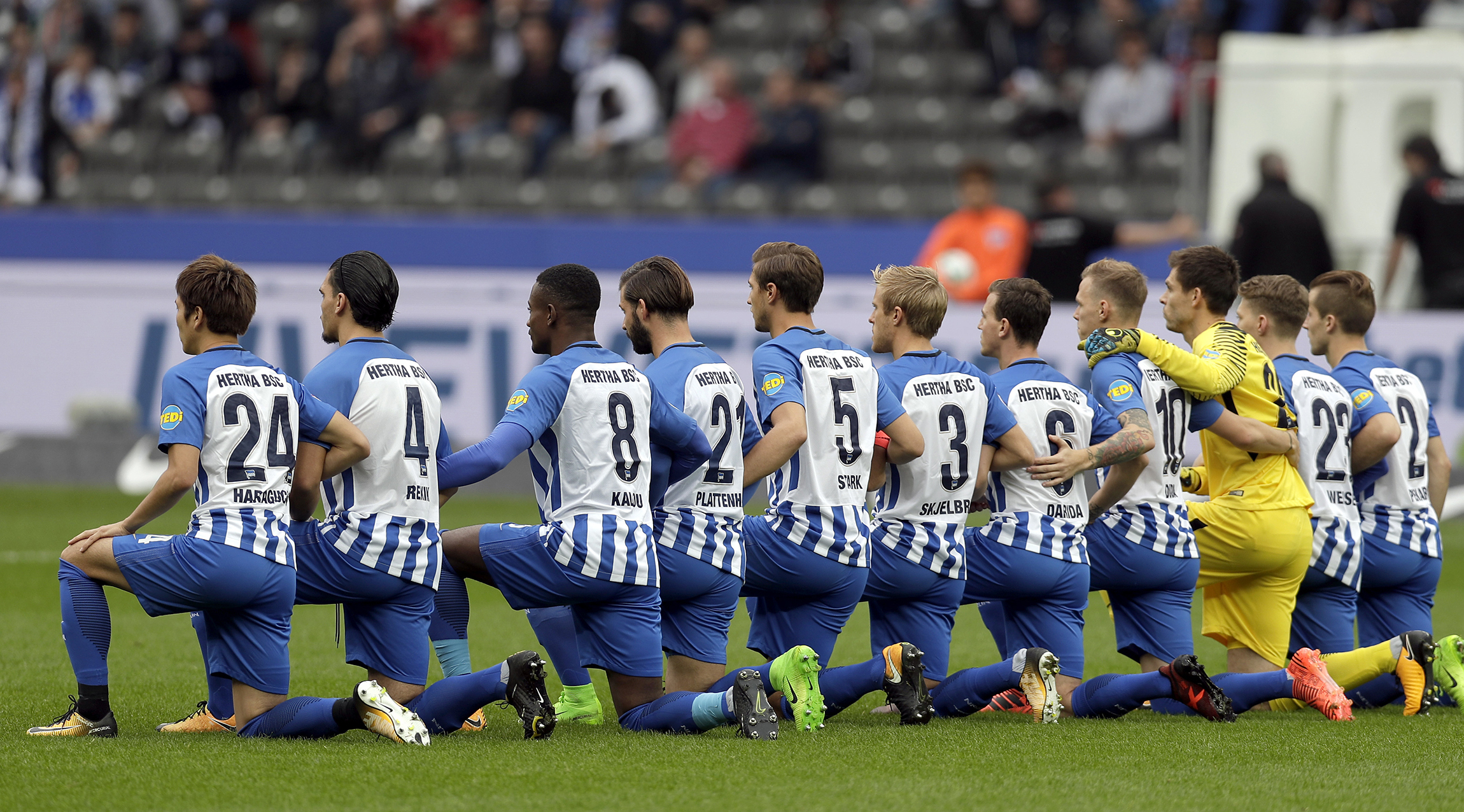 German soccer club takes a knee