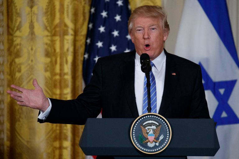 President Trump on Thursday took credit for rising optimism that is fueling a surge in stock prices. (AP Photo/Evan Vucci)