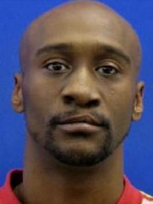 Man linked to body behind trash dump