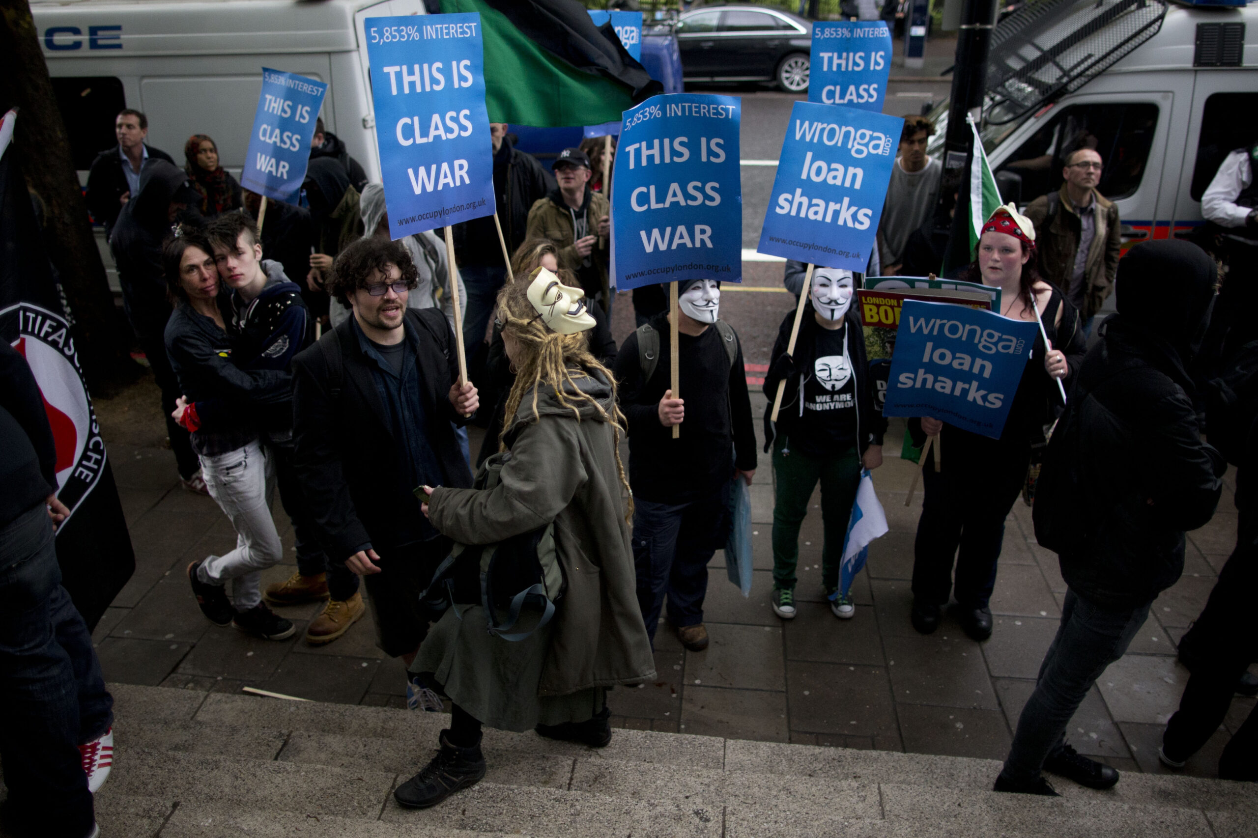 UK regulator imposes caps on payday loans
