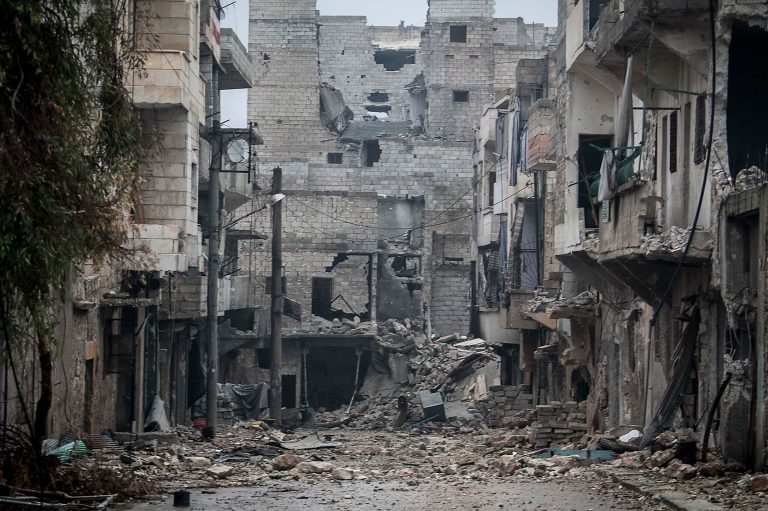   In this Friday, Dec. 07, 2012 photo, damaged buildings are seen along a desolate street on the front line after several weeks of intense battles between rebel fighters and troops loyal to Syrian President Bashar al-Assad in the Amarya district of Aleppo, Syria. As fears grow in the West that Syrian President Bashar Assad will unleash chemical weapons as an act of desperation, NATO moved forward Thursday with its plan to place Patriot missiles and troops along Syria's border with Turkey to protect against potential attacks. (AP Photo/Narciso Contreras)  