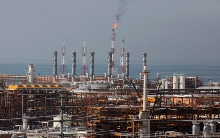 This picture taken on Wednesday, Jan. 22, 2014, shows a partially constructed gas refinery at the South Pars gas field on the northern coast of Persian Gulf in Asalouyeh, Iran. With a six-month deal in place easing sanctions as Iran negotiates a final deal with world powers, the government hopes to draw international investment to the natural gas field to spur its production. (AP Photo/Vahid Salemi)