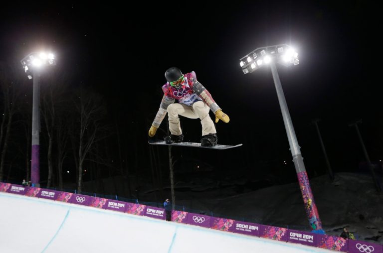 Shaun White of the United States gets air during a snowboard half pipe training session at the Rosa Khutor Extreme Park at the 2014 Winter Olympics, Monday, Feb. 10, 2014, in Krasnaya Polyana, Russia.  (AP Photo/Andy Wong)
