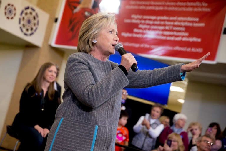 Hillary Clinton's competition for the Democratic presidential nomination appears largely responsible for her decision to emphasize combatting Wall Street and taxing the wealthy while in Iowa. (AP Photo)