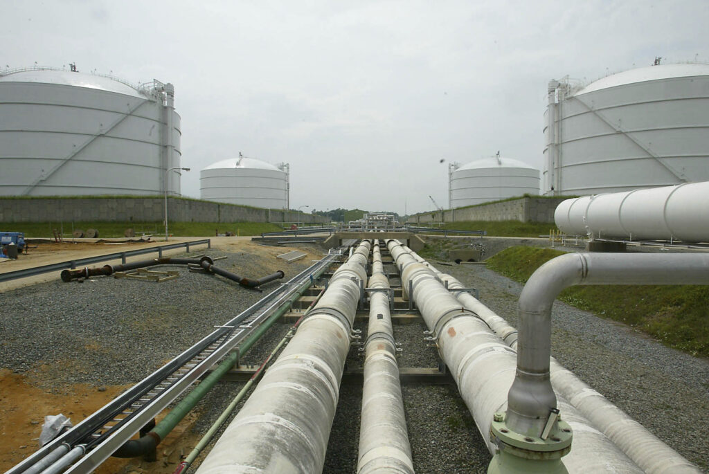 Pipelines run from the offshore docking station to the four LNG tanks capable of holding 2.5 billion cubic feet of LNG apiece as shown Friday, June 13, 2003, at the Dominion Liquified Natural Gas facility in Cove Point, Md.ÃÂ Environmental groups fired a shot Tuesday in the growing discussion about natural gas exports as they urged President Obama to block new export terminals on climate change grounds.ÃÂ (AP Photo/Matt Houston, file)