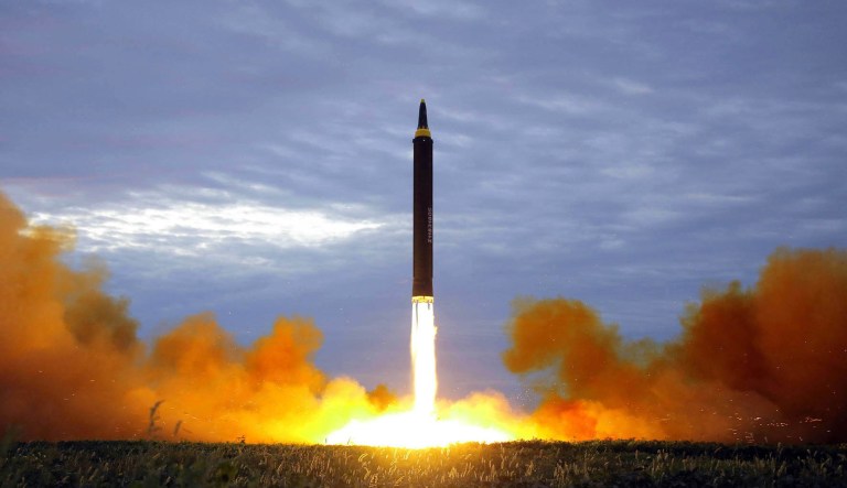 The North Korean government launched an intermediate-range missile that flew over Japan in its longest-ever flight on Friday, showing that leader Kim Jong Un is defiantly pushing to bolster his weapons programs despite U.S.-led international pressure.
		 (Korean Central News Agency/Korea News Service via AP, File)