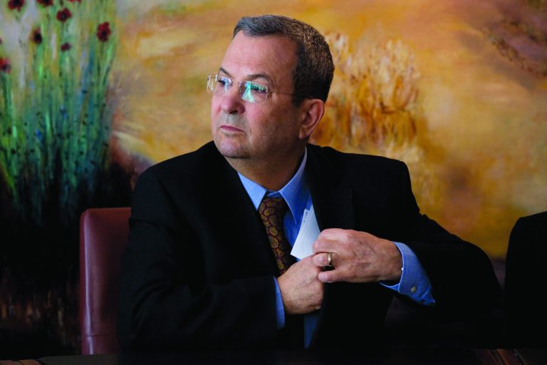 FILE - In this Monday, Jan. 17 2011 file photo, Israeli Defense Minister Ehud Barak attends a press conference in the Knesset, Israel's parliament, in Jerusalem. Barak calls for a broad unilateral withdrawal from the West Bank if peace talks remain stalled, saying 