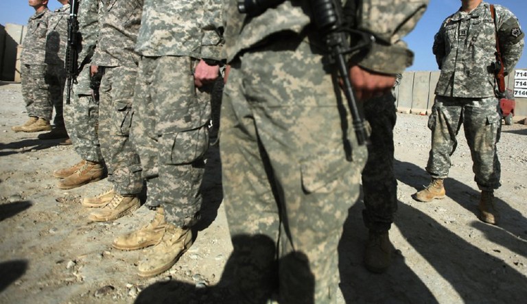 Preparing more than 23,000 military recruiters and medical evaluators for the recruiting ordered to begin in two weeks by federal courts would not be difficult or time-consuming, former surgeons general of the Navy and Army and a former Coast Guard director of health and safety wrote in the paper set to be published by the Palm Center rights group Monday. (AP Photo)