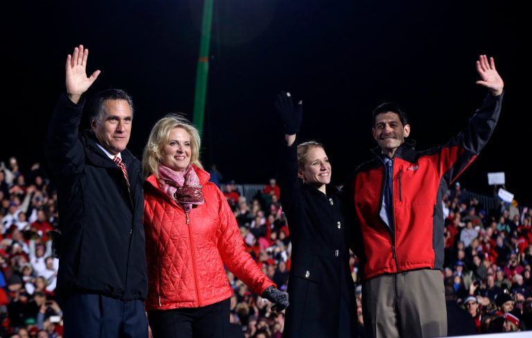 Former Massachusetts Gov. Mitt Romney and his wife Ann Romney, accompanied by Rep. Paul Ryan, R-Wis., and his wife Janna Ryan, wave to supporters at a campaign rally at the Square at Union Centre in West Chester, Ohio, Friday, Nov. 2, 2012. (AP Photo/Charles Dharapak)