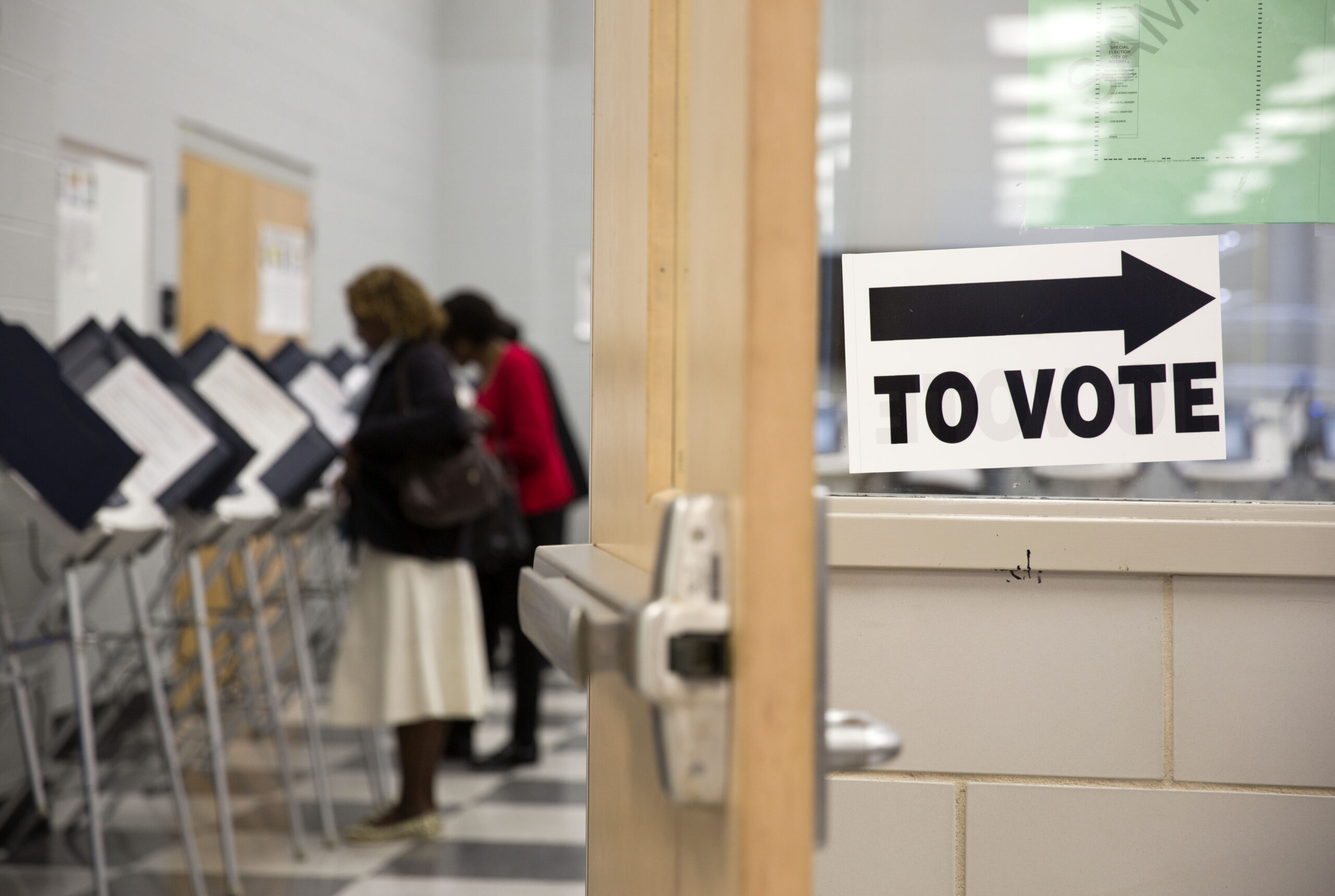 Americans: Make it easier to vote, but not mandatory