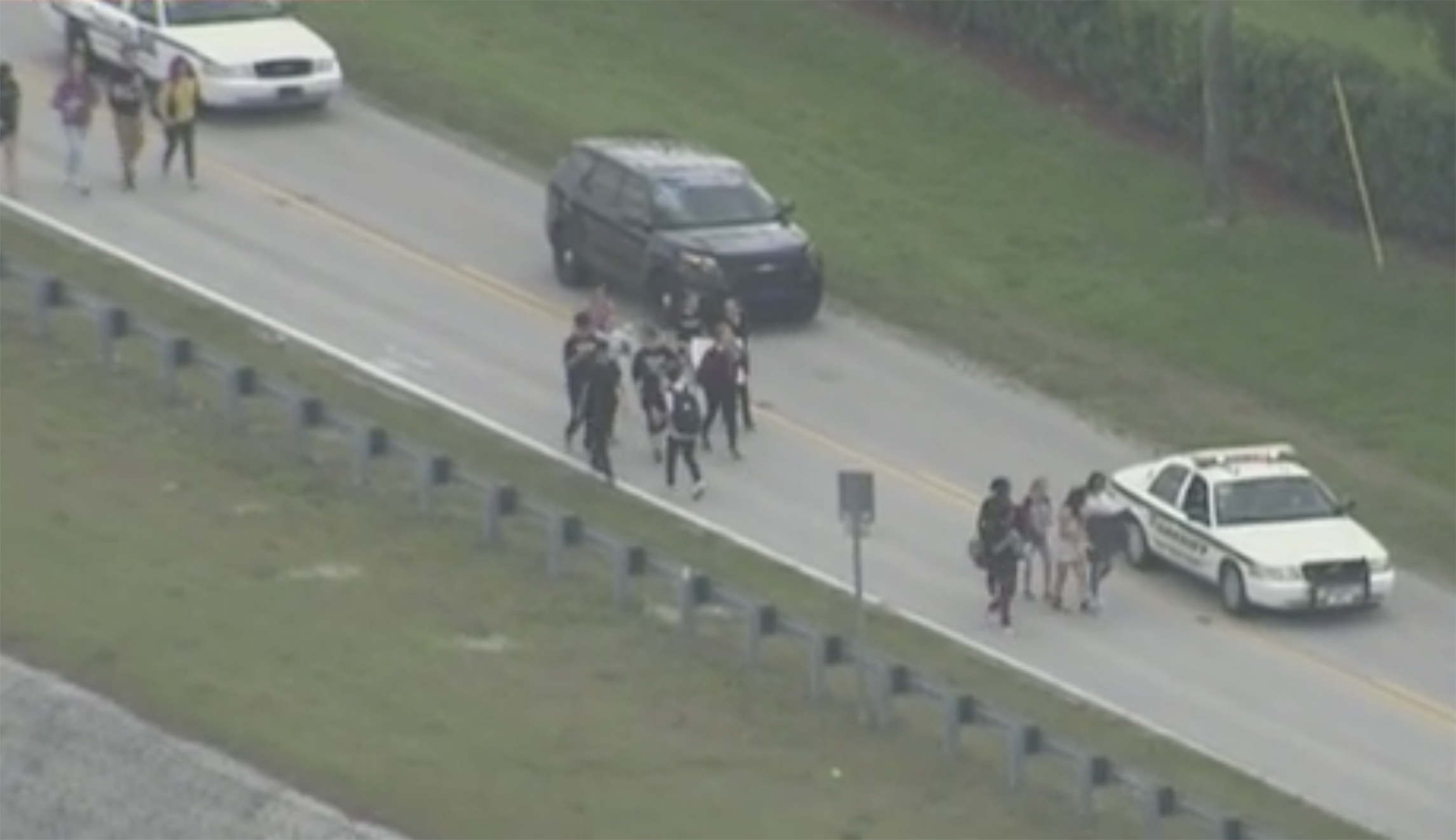 Florida students walk out of classes, embark on 10-mile walk to site of last week’s school shooting: Watch
